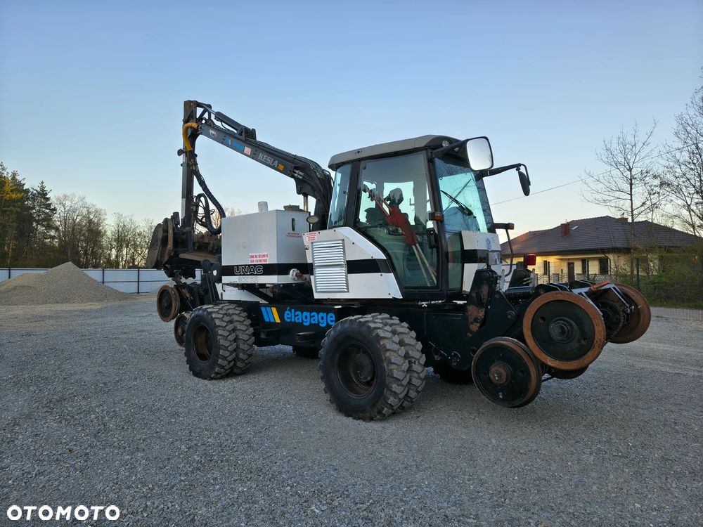 Caterpillar UNAC 300RR Mulczer kolejowy Liebherr atlas dwudrogowy zw - 3