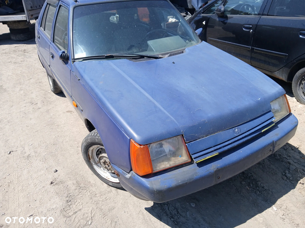 zaz1103 slavuta silnik 1.3 SOHC MeMZ 3011 skrzynia napęd sanki belka wahacz wahacze zacisk zaciski