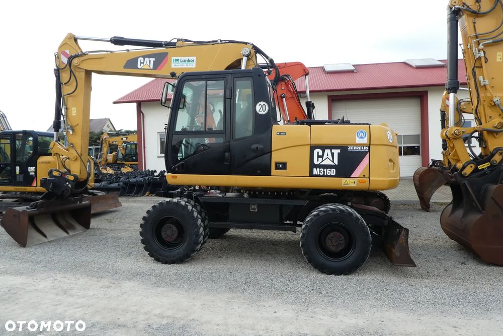 Caterpillar M316D - 32