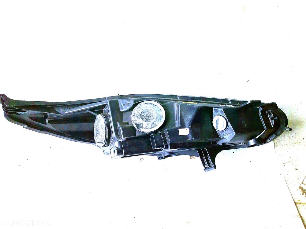 ford fiesta mk7 lampa przód lewa nowa oryg z uszk - 5