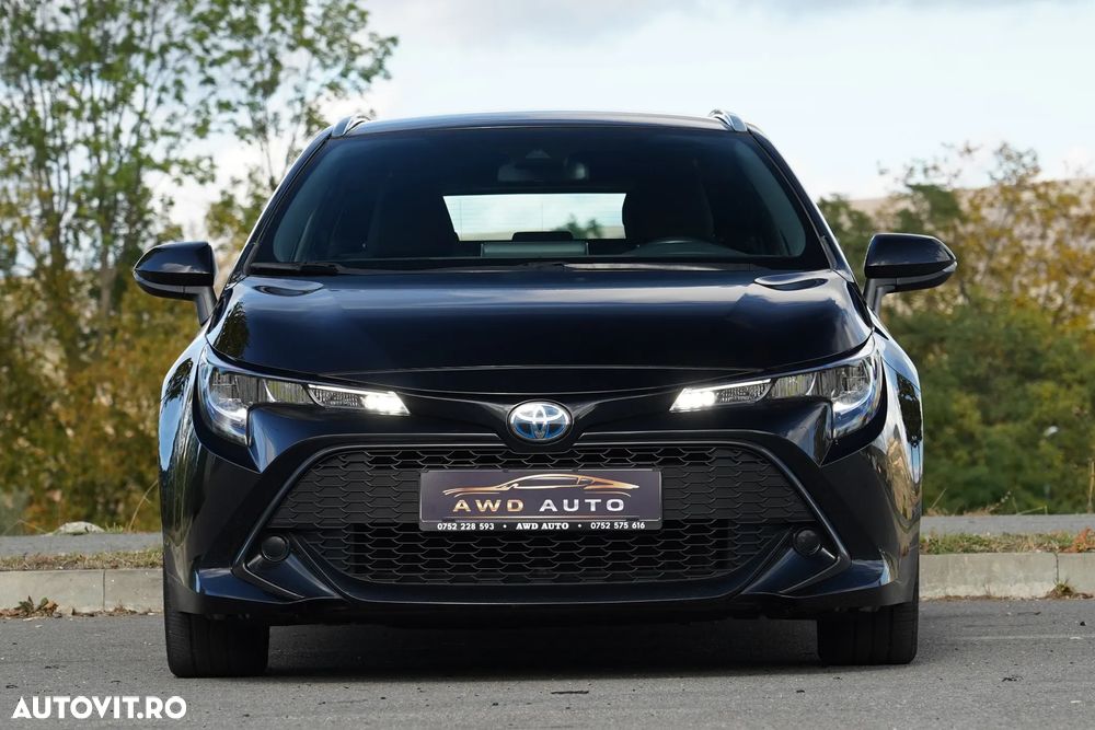 Toyota Corolla 1.8 HSD Business - 21