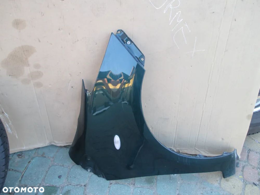 Błotnik prawy TOYOTA YARIS II 6S3 orginał bez rdzy - 1