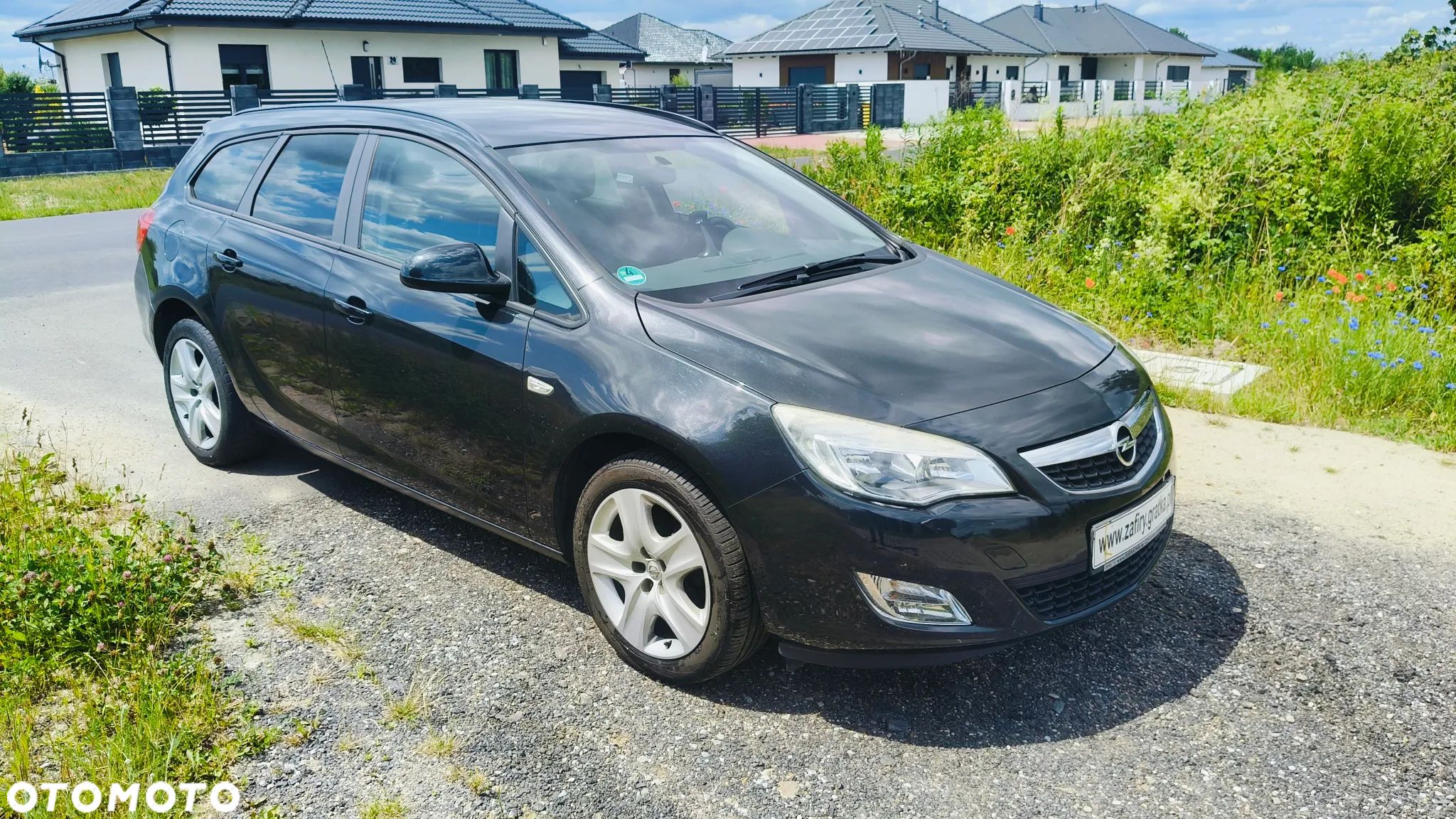 Opel Astra 1.4 Turbo Sports Tourer Design Edition - 1