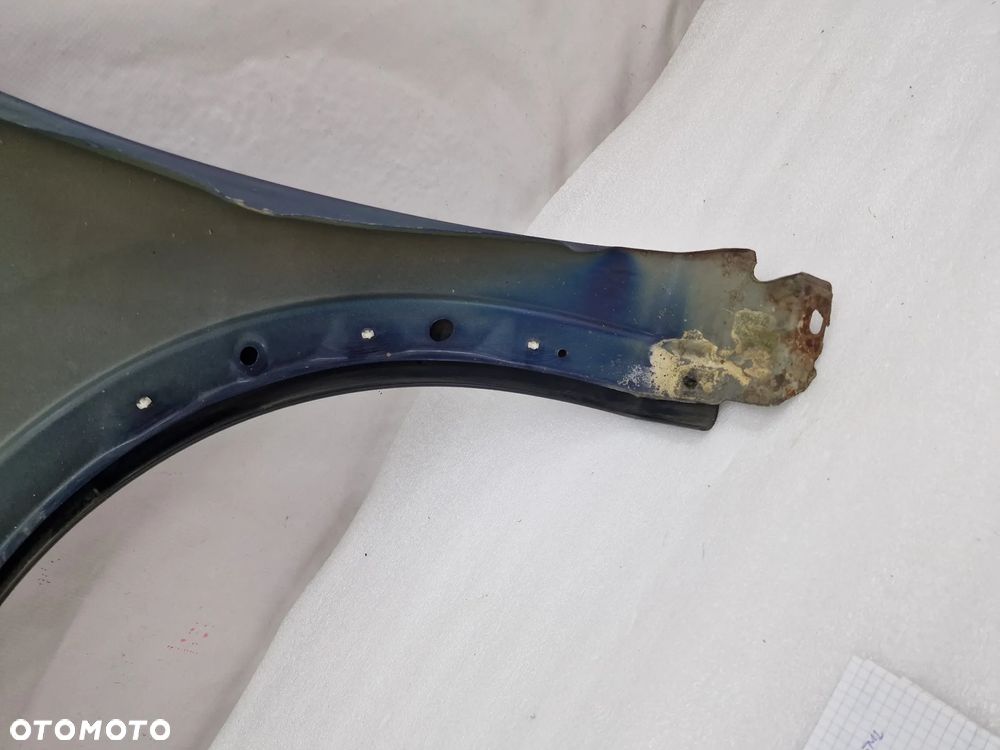 OPEL CORSA C LIFT 03-06 PRAWY BŁOTNKI PRZEDNI PRZÓD , GRANATOWY NIEMIETALIK , NR AUKCJI BŁ209 - 12