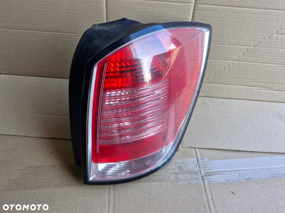 Lampa prawa tylna prawy tył Opel Astra H III KOMBI przedlift