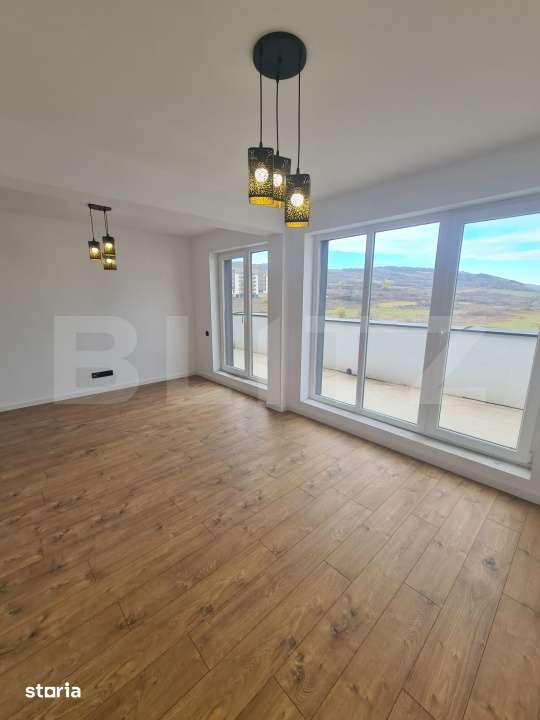 Apartament finisat, 52 mp utili, terasa 34 mp, zona Terra — fotografia 1