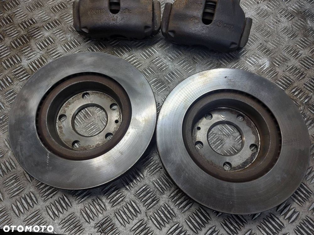 TARCZE HAMULCOWE PRZÓD + KLOCKI + ZACISKI VOLKSWAGEN PASSAT B5 1.9 TDI - 2