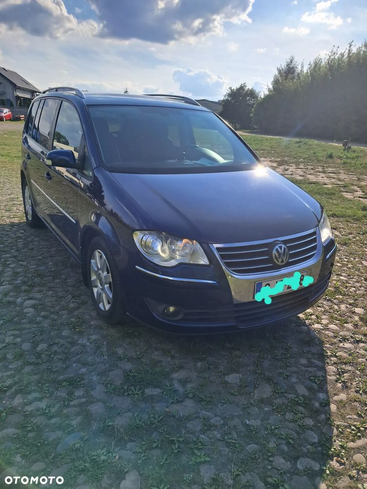 Volkswagen Touran 1.4 TSI Conceptline DSG - 1