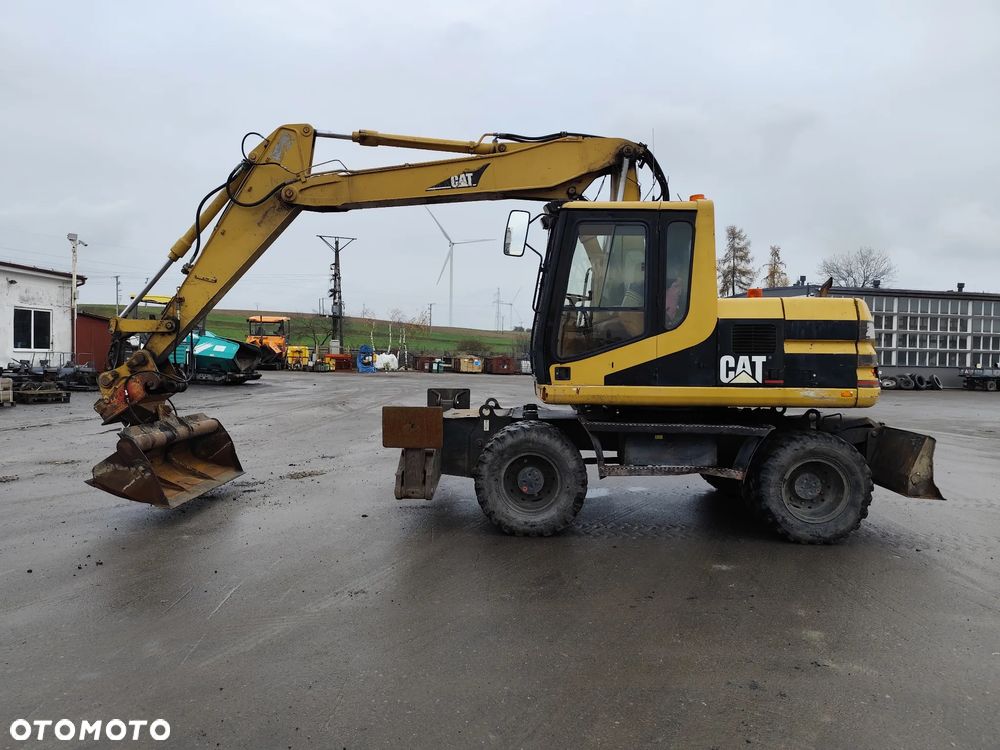 Caterpillar M 312 - 1