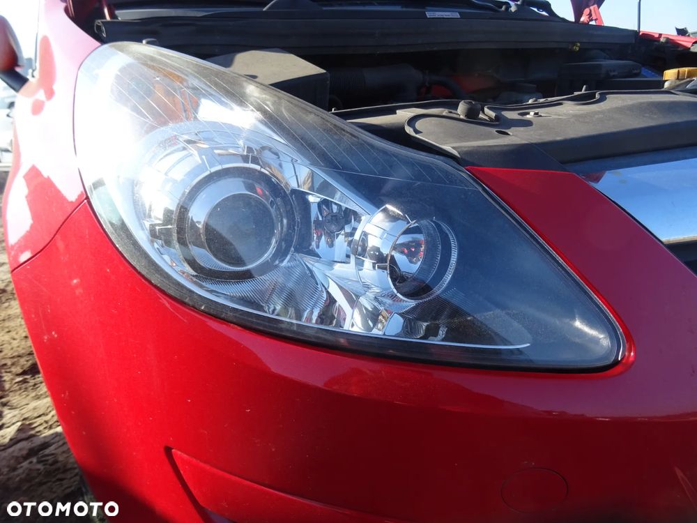 Opel Corsa D lampa reflektor prawy przód soczewka skrętna - 1