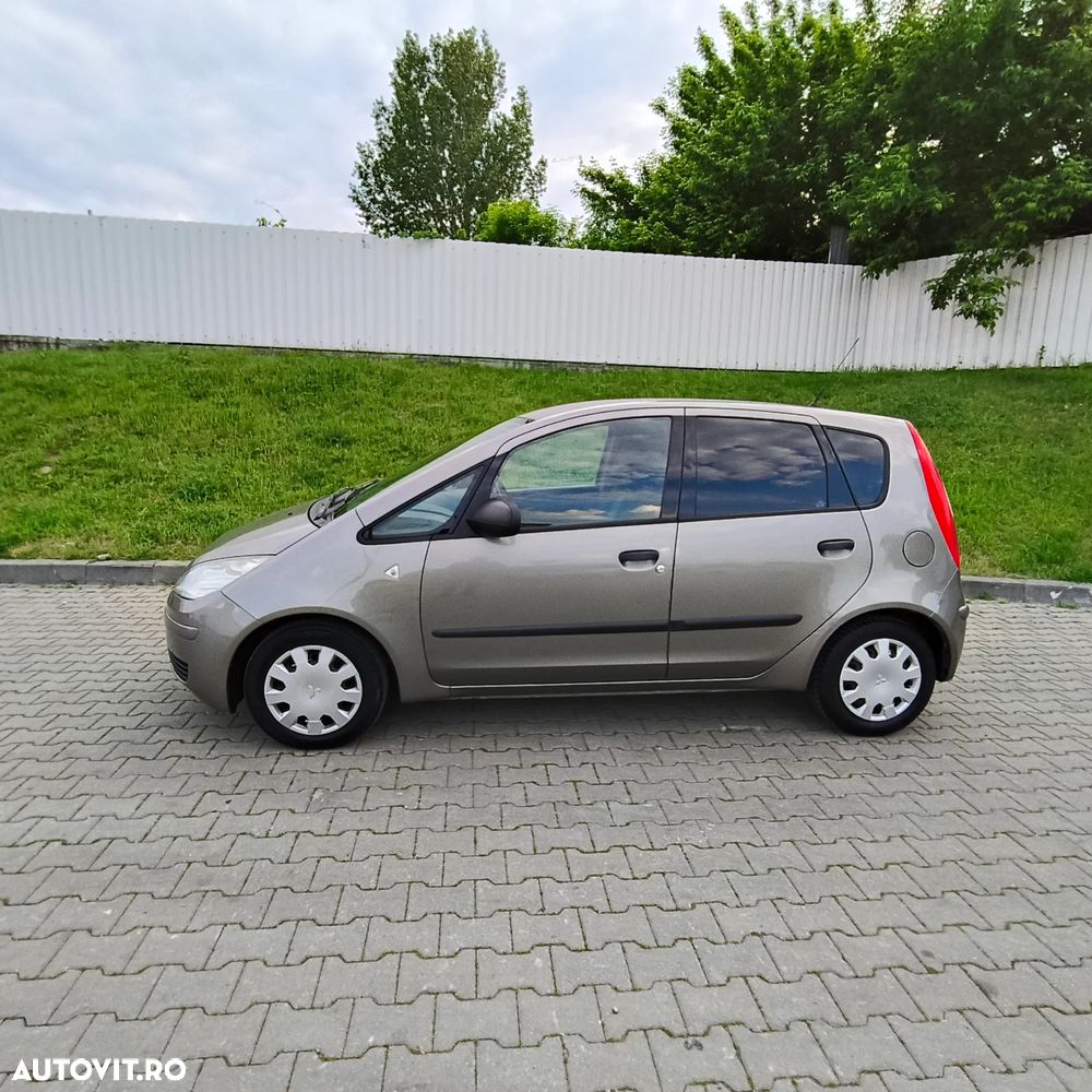 Mitsubishi Colt 1.1 Inform + - 2