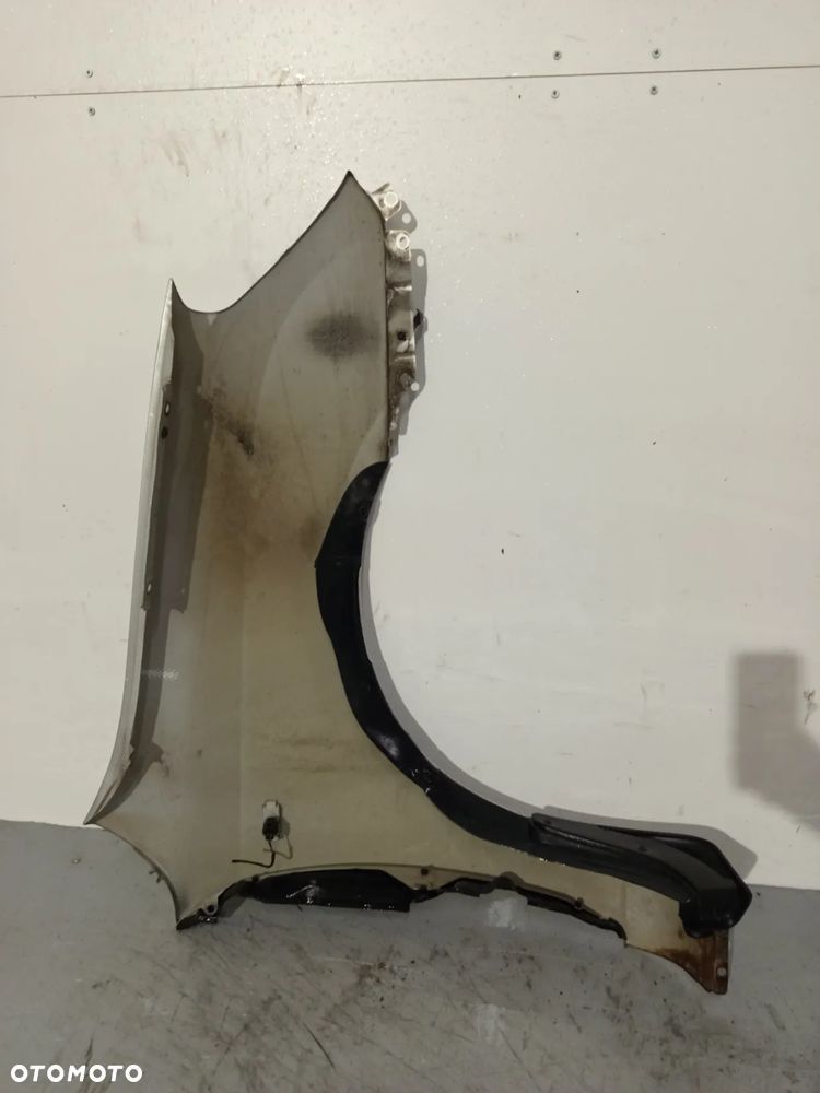 BŁOTNIK PRZÓD PRZEDNI LEWY KIA CARENS 3 III 7S SREBRNY - 4