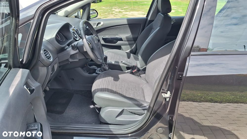 Opel Corsa 1.2 16V Enjoy - 11