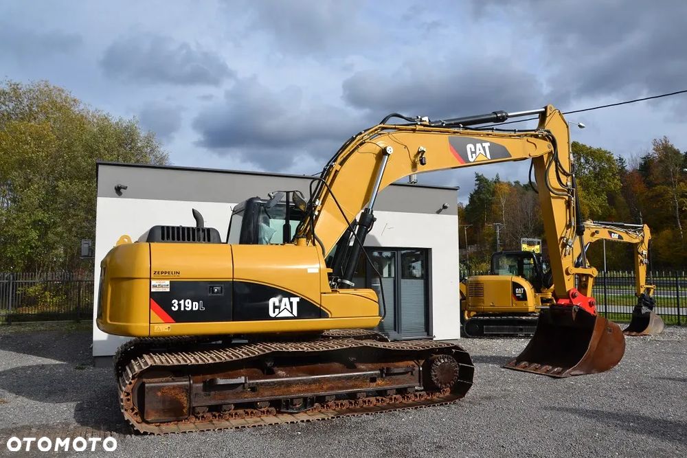 Caterpillar CAT 319 DL - 11