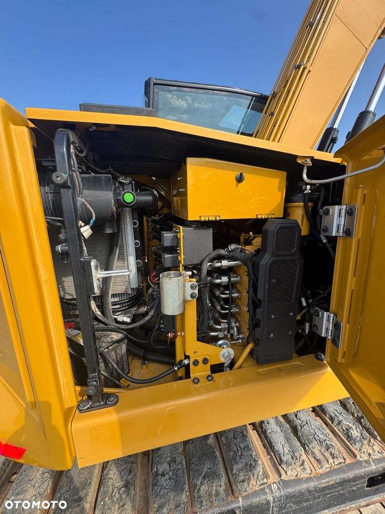 Caterpillar 310 - 19