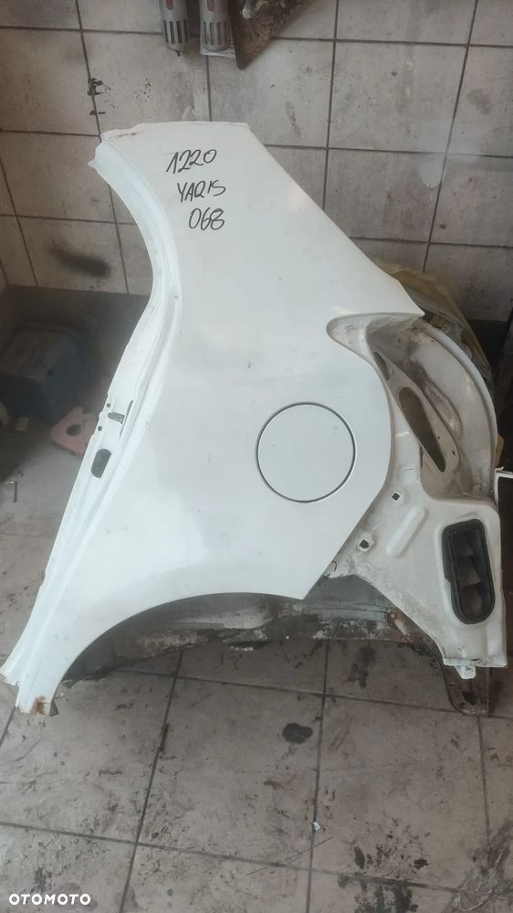 TOYOTA YARIS II BŁOTNIK LEWY TYLNY LEWY TYŁ ĆWIARA ĆWIARTKA  KOLOR: 068 - 2