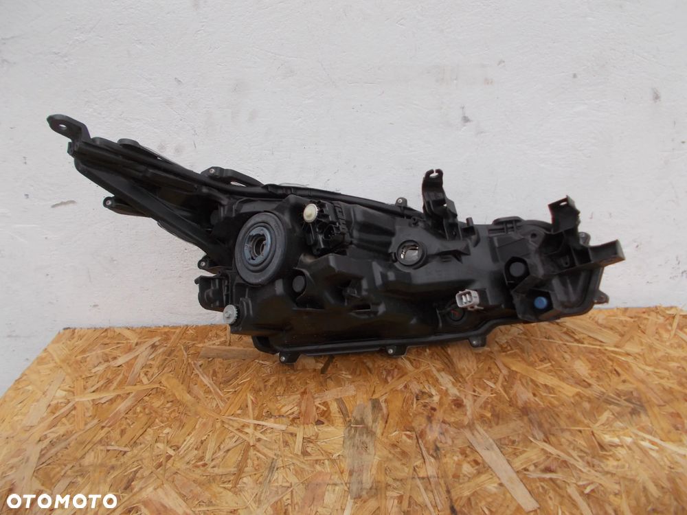 TOYOTA COROLLA E21 SEDAN LAMPA LEWA 81150-02T30-00 - 4