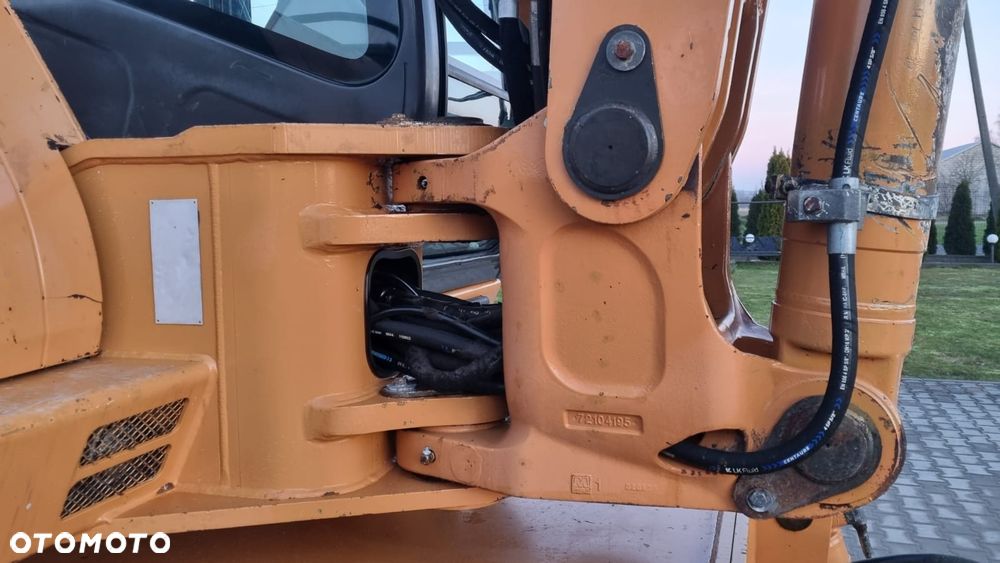 Case WX 125/ Łyżka skarpowa/ Maszyna sprowadzona/ - 18