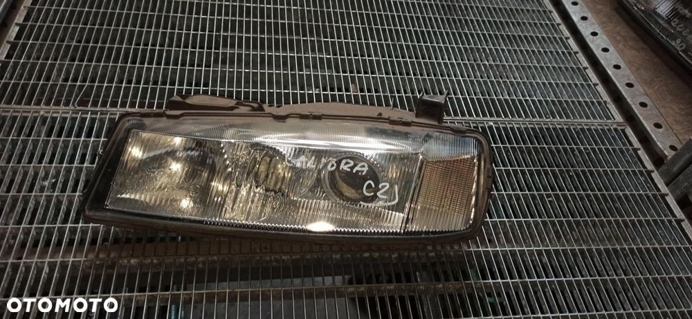 Opel calibra reflektor lampa przednie 2 soczewki odblaski igła brak jednego zaczepu gwarancja - 1