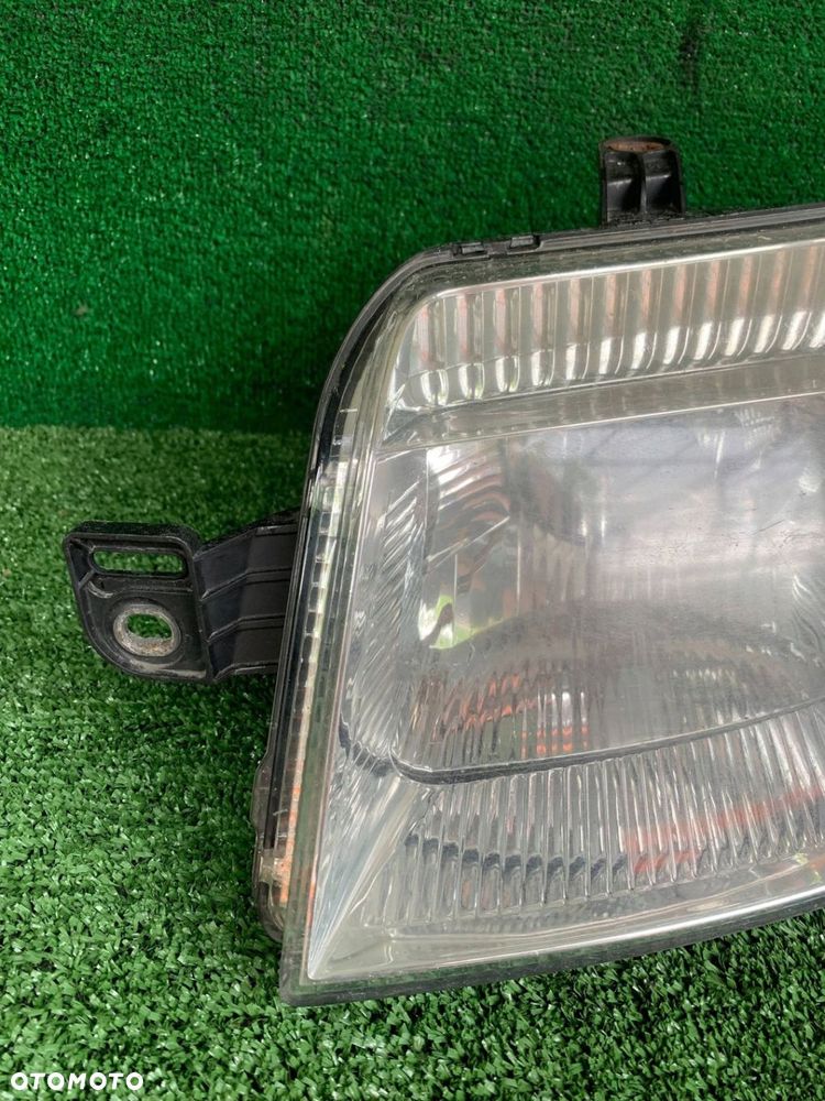 Lampa przód przednia lewa Fiat Panda II Europa 51867677 WWA - 2