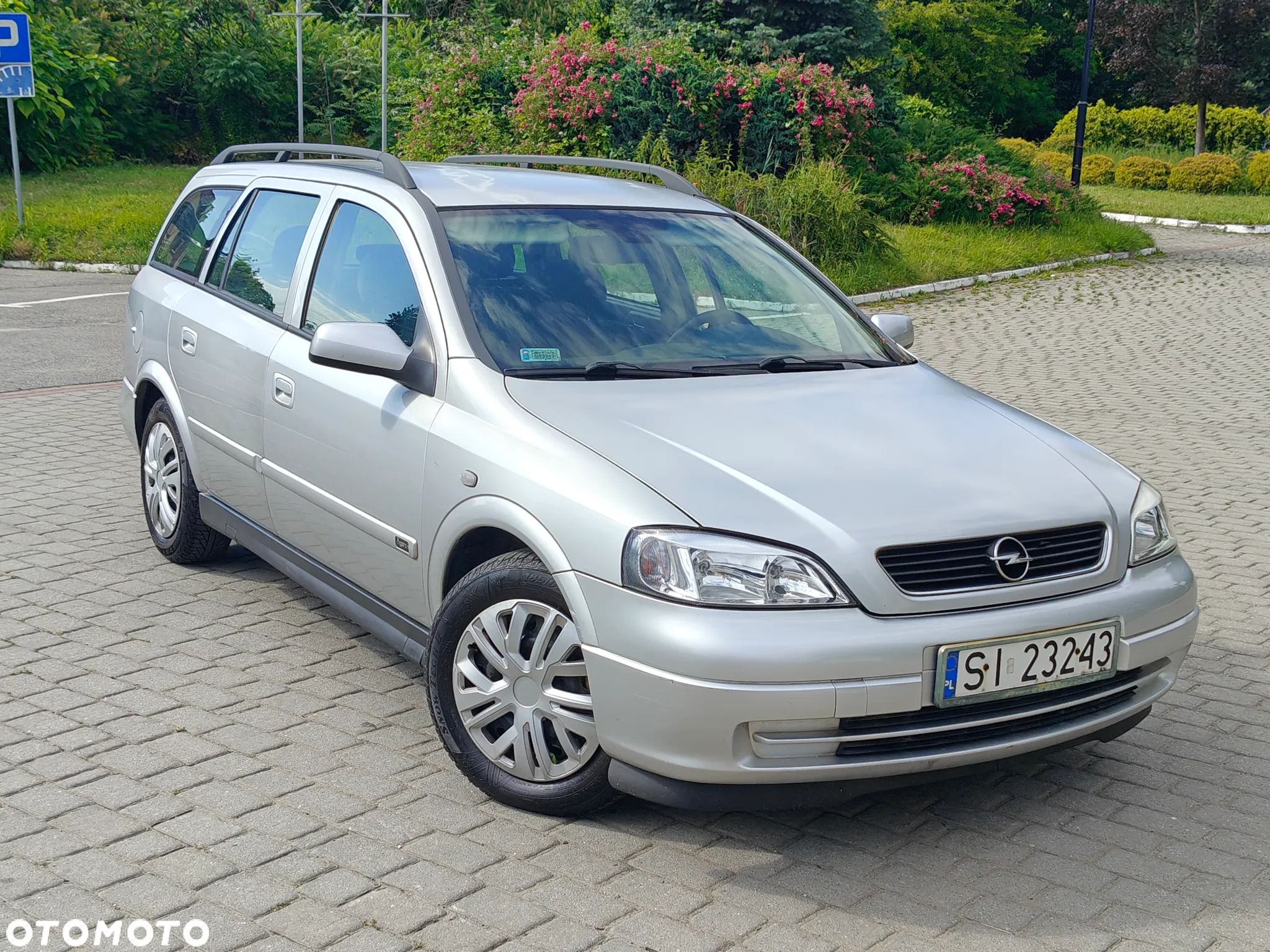 Opel Astra 1.8 Caravan Cosmo - 1