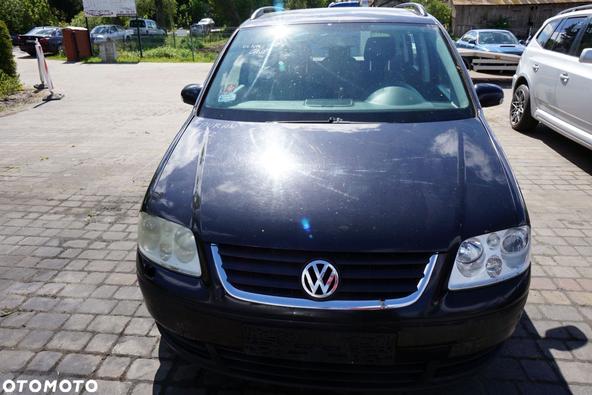 MASKA ZDERZAK BŁOTNIKI LAMPY TOURAN I 1T LC9Z XENON SPRYSKI VOLKSWAGEN 2003-2006 CZARNY PRZÓD KOMPLETNY - 1
