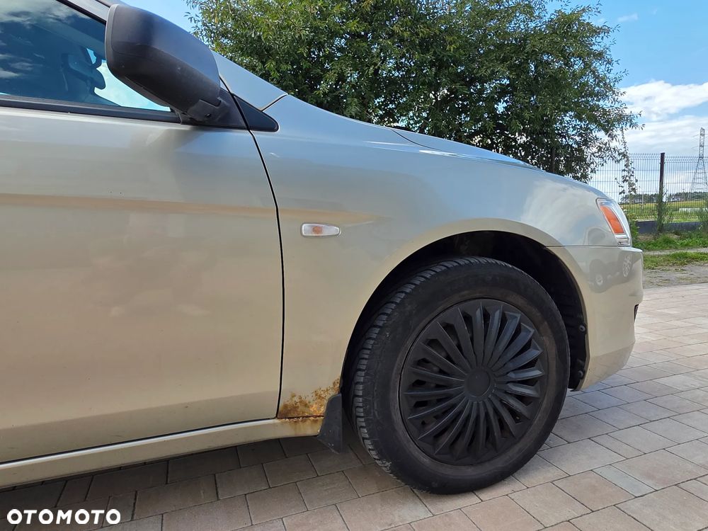 Mitsubishi Lancer 1.5 Inform - 10