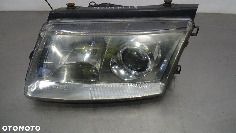 LAMPA LEWA PRZEDNIA VOLKSWAGEN PASSAT B5 - 1