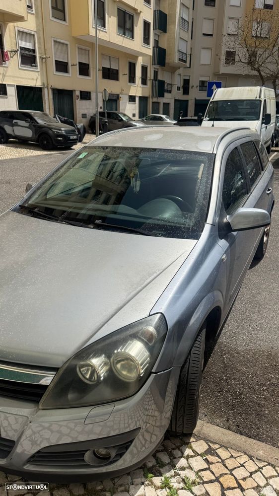 Opel Astra Caravan 1.3 CDTi Cosmo - 1