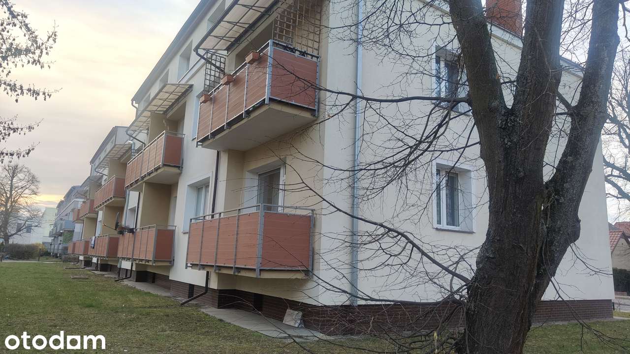 Dwa pokoje z balkonem wysoki parter