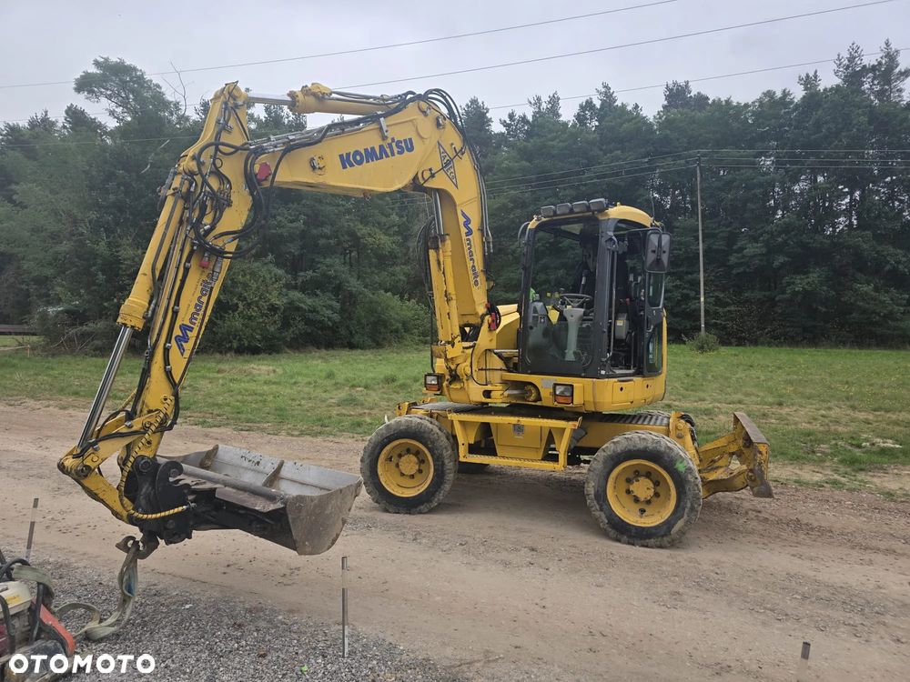 Komatsu 118 MR - 1