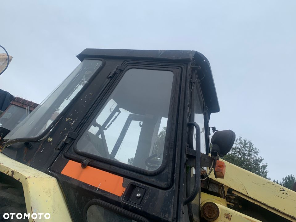 Kabina do koparkoładowarki CAT 428 B koparko ładowarki - 1