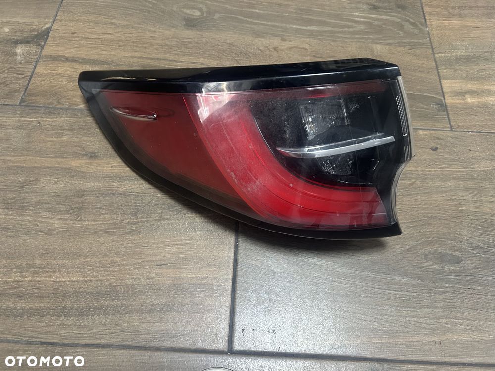Lampa tylna lewa TOYOTA COROLLA E21 18-22 KOMBI ORG. - 1