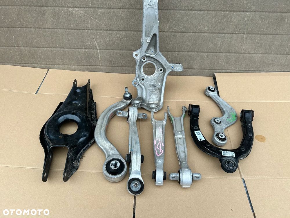 TESLA MODEL 3 ZWROTNICA WAHACZ ZAWIESZENIE PRZÓD TYŁ