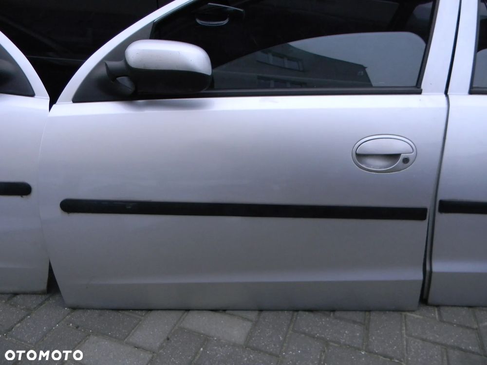 drzwi lewe prawe tył przód OPEL CORSA C Z147 5D - 6
