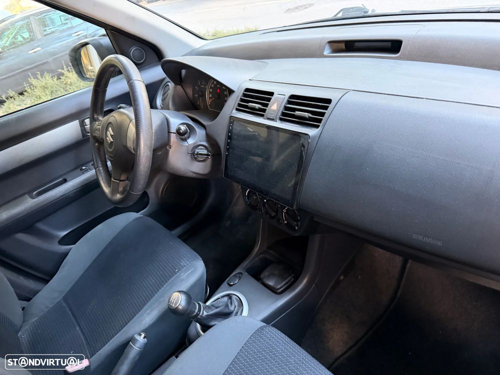Suzuki Swift 1.3 DDiS Quiksilver - 17