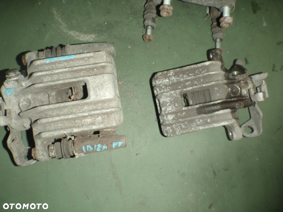 zacisk jarzmo prowadnica hamulcowe tył tylne passat b5 fabia polo golf IV audi a3 a2 ibiza - 2