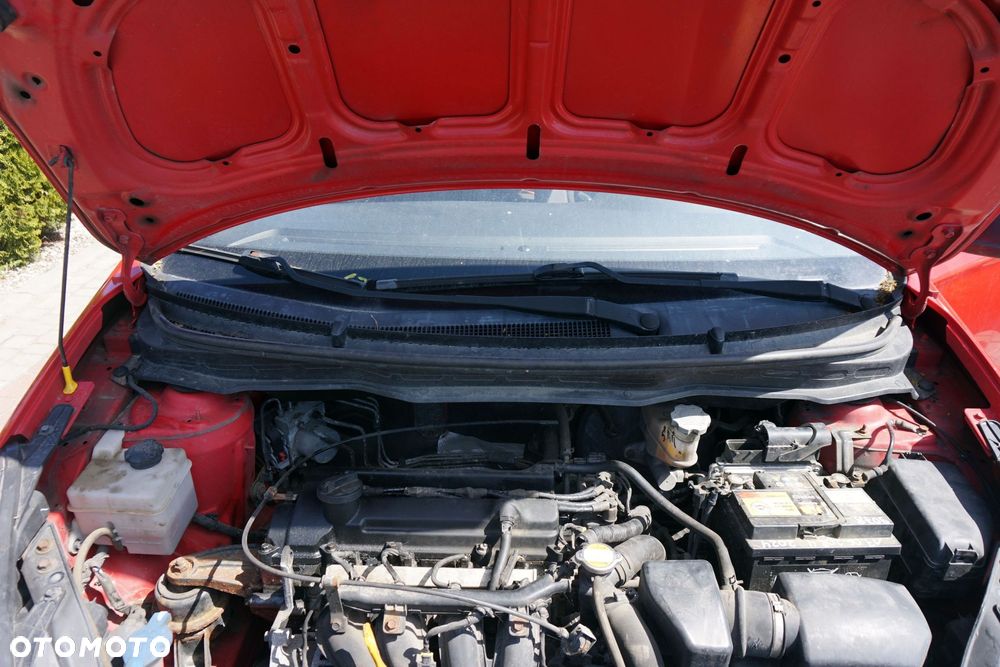 MECHANIZM WYCIERACZEK PRZEDNICH SILNICZEK I20 I 98100-1J000 HYUNDAI 2008-2012 - 1