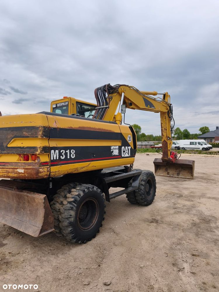 Caterpillar M318 - 5