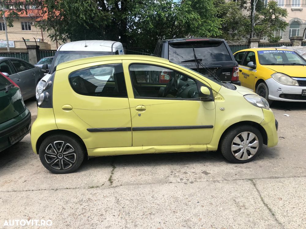 Dezmembrez Citroen C1 galben 2006 1.0 benzina 4 usi - 4