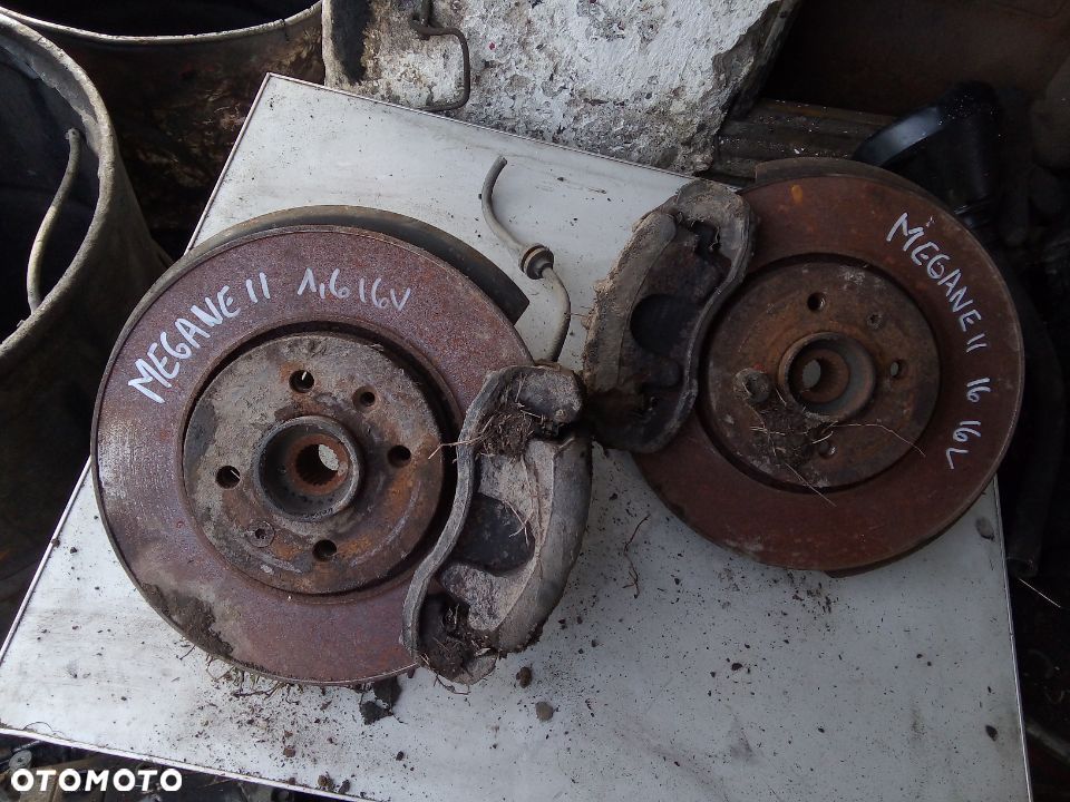 Renault megane II 1,6 16V przód TYŁ  zwrotnica zacisk jarzmo tarcza 1,9dci 1,4 16V - 1