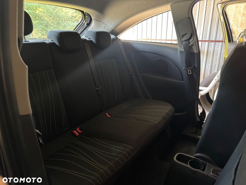 Opel Corsa 1.4 16V Enjoy - 11