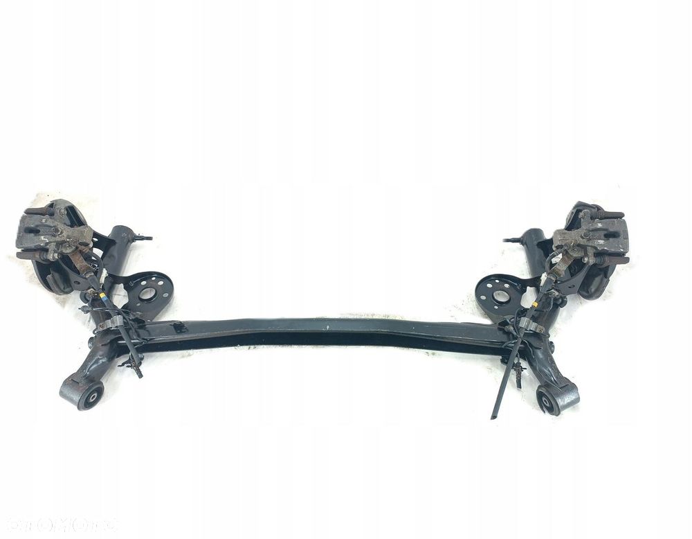 BELKA OŚ TYŁ TYLNA ZAWIESZENIA TARCZE SUZUKI SWIFT MK7 10-16R 4X4 - 1