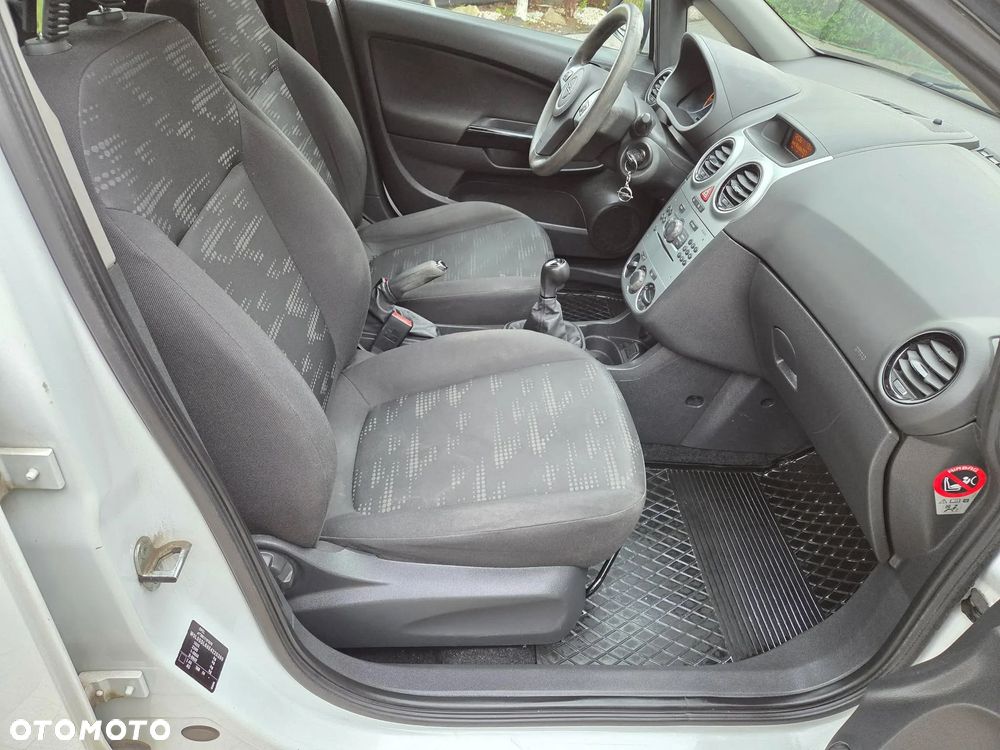 Opel Corsa 1.2 16V Enjoy - 23