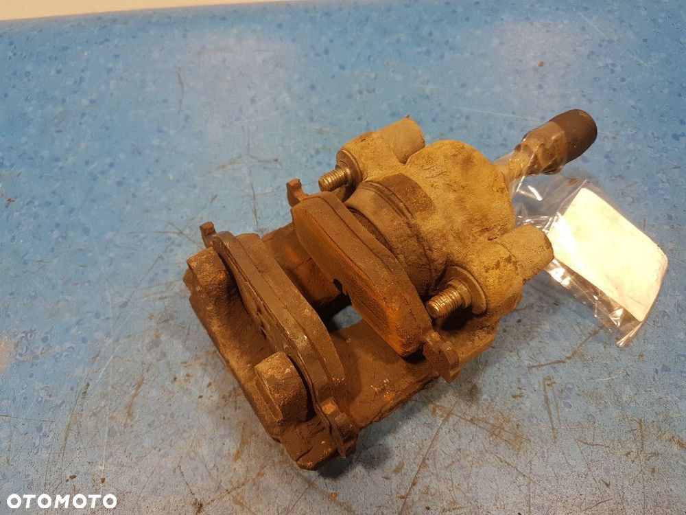 BMW 1 E87 2.0D ZACISK HAMULCOWY TYŁ PRAWY  N47 - 6