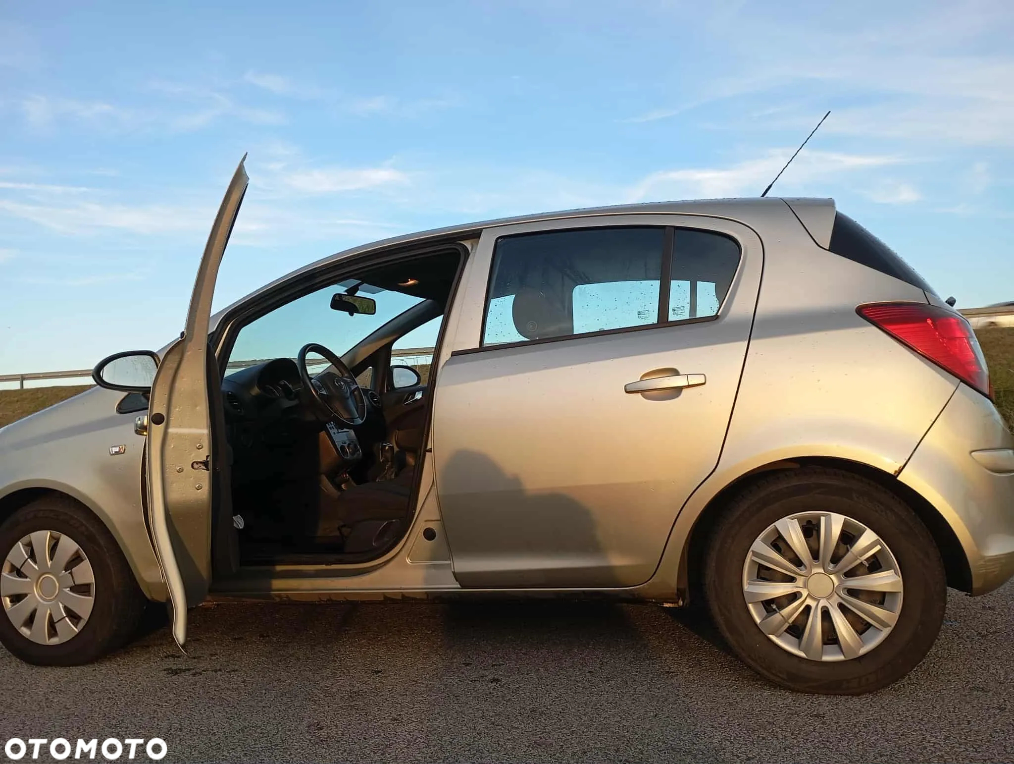 Opel Corsa 1.2 16V Cosmo - 11