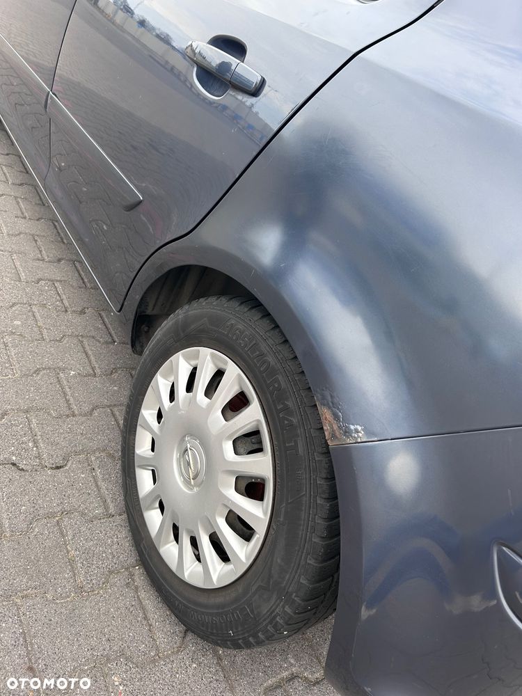 Opel Corsa 1.2 16V Enjoy - 5