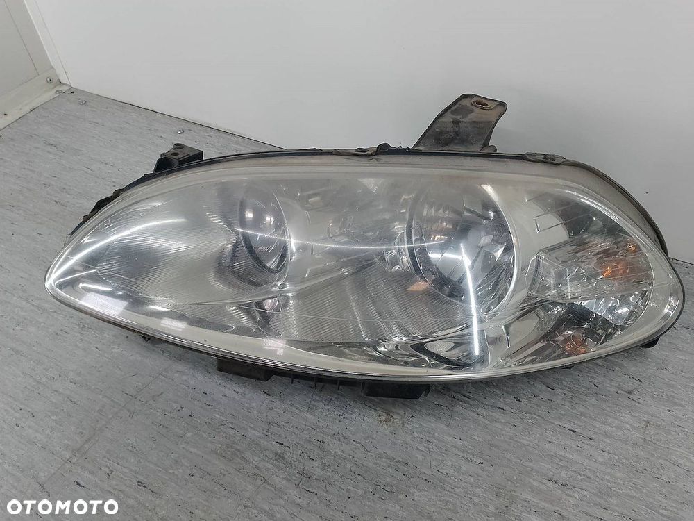 LAMPA PRZÓD LEWA FIAT CROMA 2005- 51801266 1.9 JTD - 6