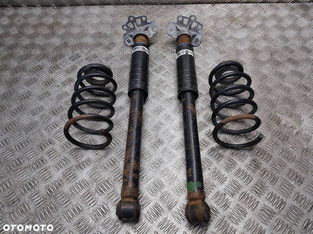 AMORTYZATOR + SPRĘŻYNA LEWY TYŁ + PRAWY TYŁ KOMPLET OPEL CORSA D - 1