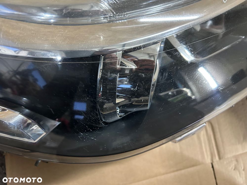 Renault Koleos I lift 2011- lampa lewy przód prawy przód europa soczewka - 13